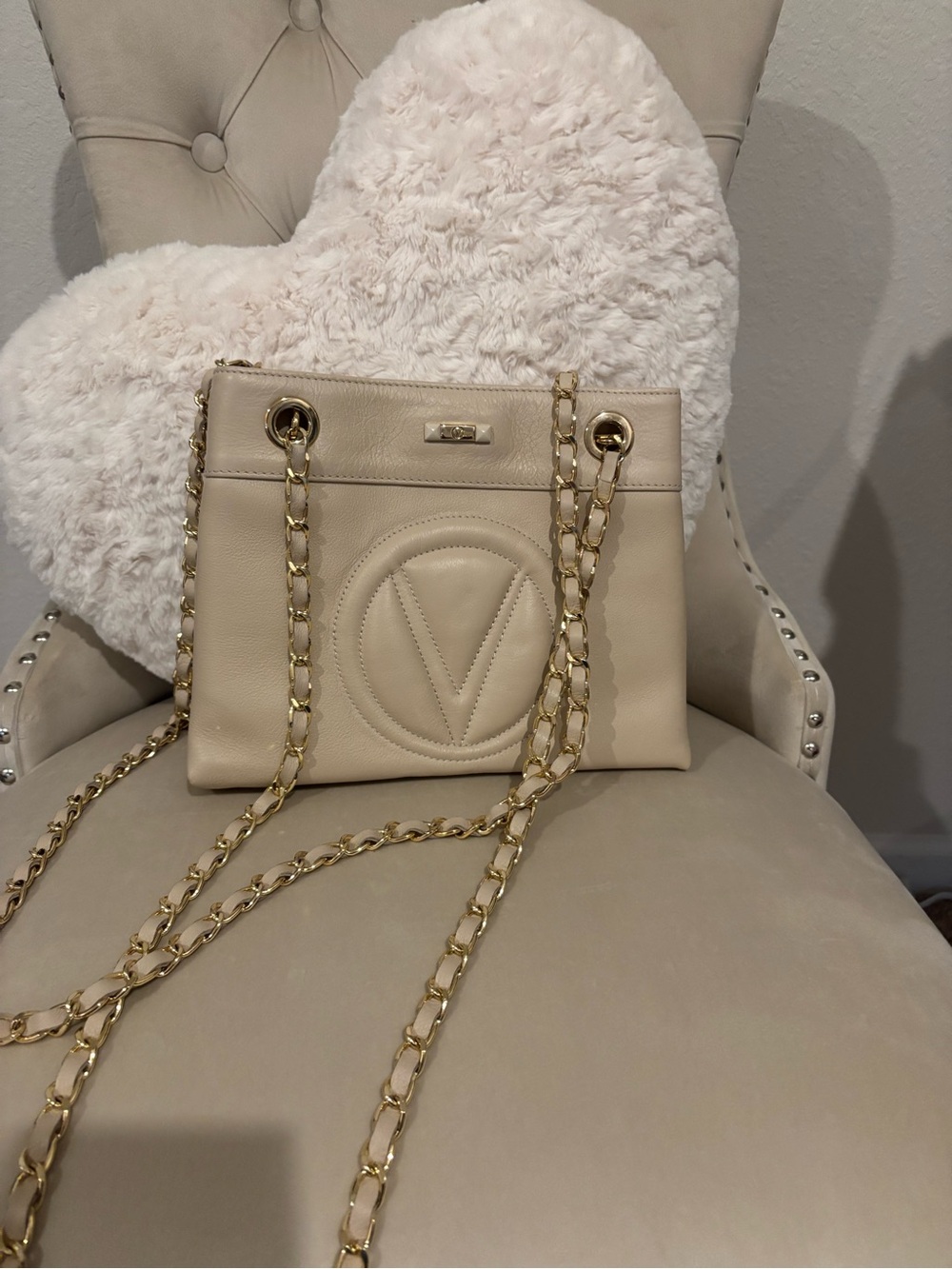 Cream Leather Shoulder Bag with Gold Chain Straps and Embossed Logo
